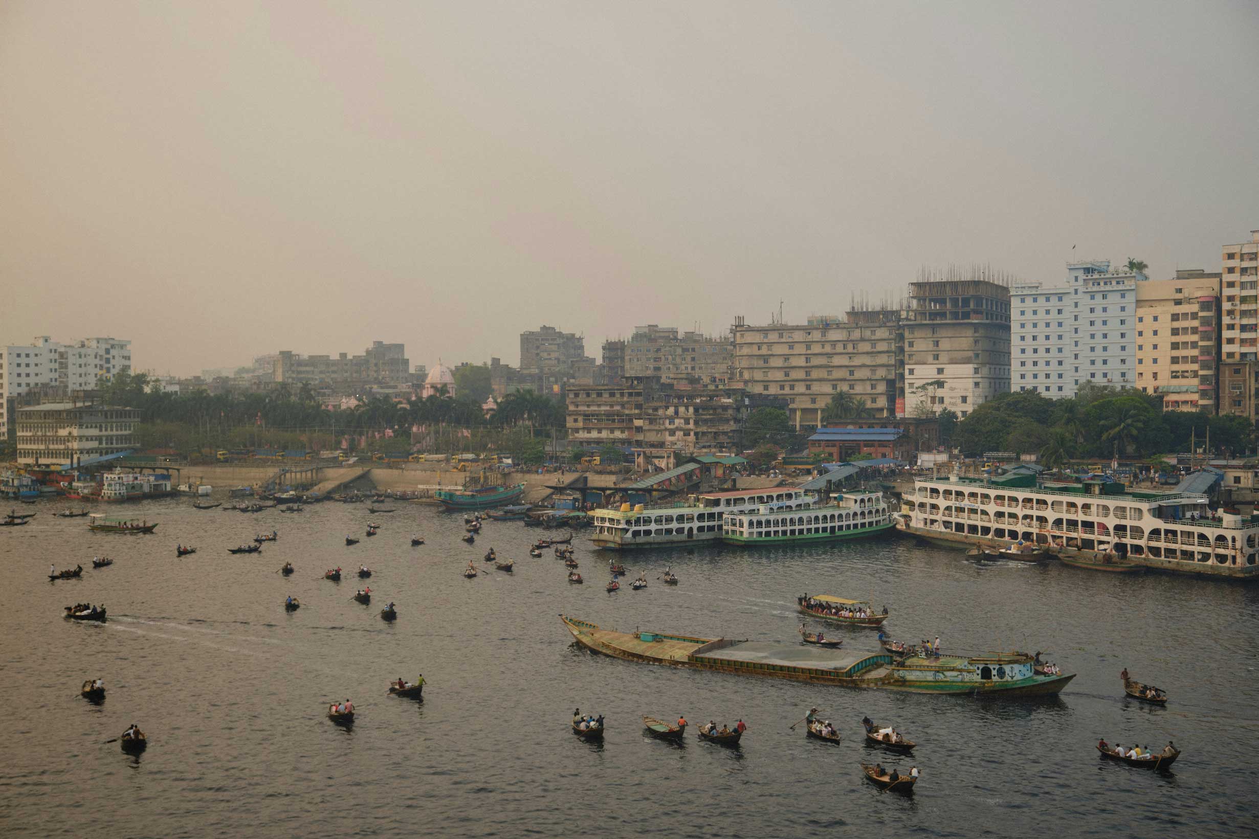 Wooden boats on a river in Bangladesh at sunrise — photography scene